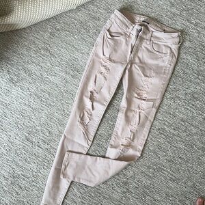 American Eagle // Light Pink Distressed Jeggings